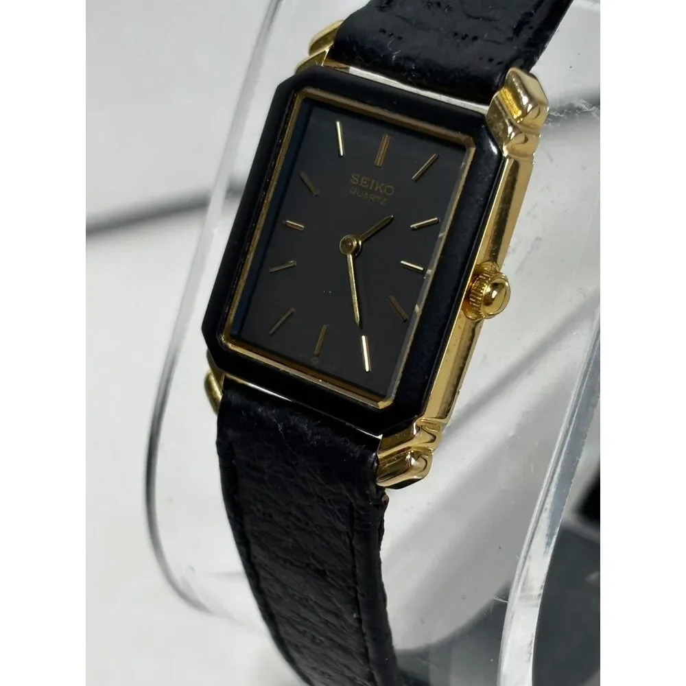 Vintage Seiko 2P20-5000 gold tone women's watch with black leather, working